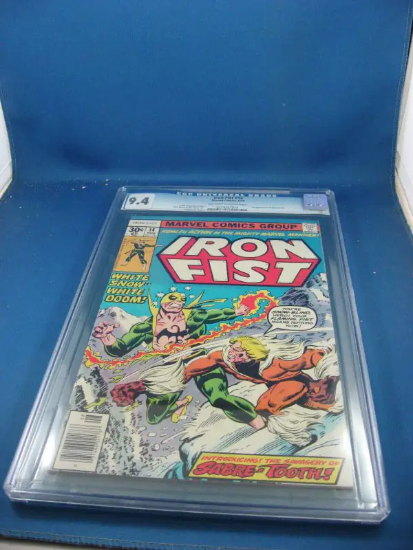 Iron Fist #14 (Marvel Comics, 1977), CGC 9.4 graded comic book, Universal Blue label — front cover in its holder