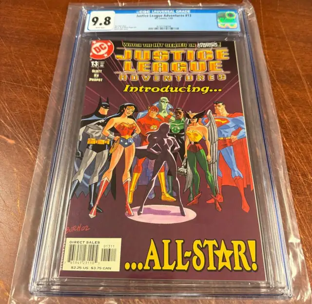 Justice League Adventures #13 (DC Comics, 2003), CGC 9.8 graded comic book, Universal Blue label — front cover in its holder