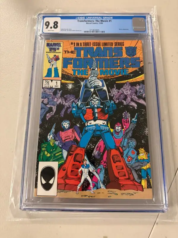 Transformers the Movie #1 (Marvel Comics, 1986), CGC 9.8 graded comic book, Universal Blue label — front cover in its holder