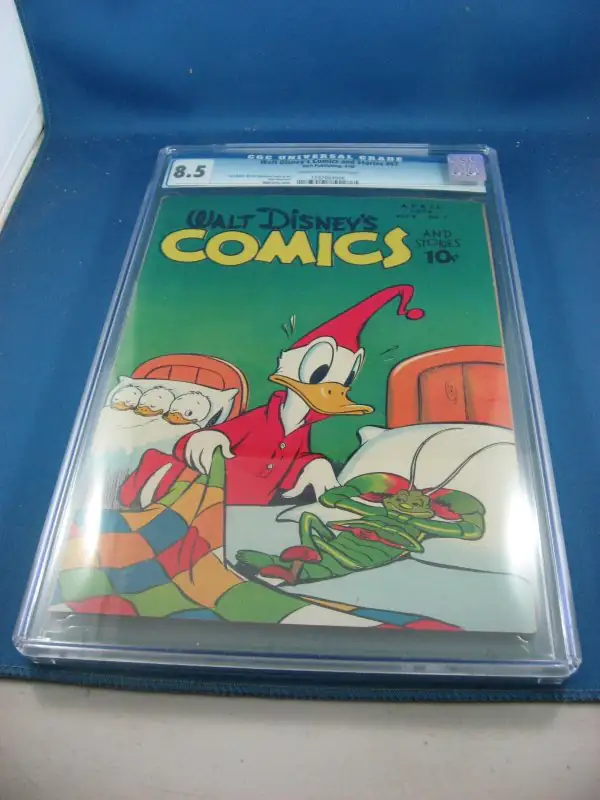 Walt Disney Comics Stories #67 (Dell Comics, 1946), CGC 8.5 graded comic book, Universal Blue label — front cover in its holder